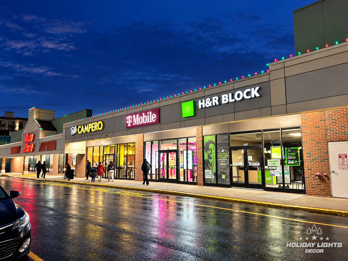 Alternating red and green lights continue across several plaza storefronts.