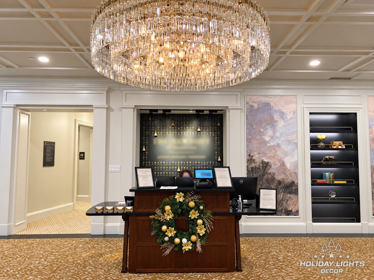 Reception area featuring a coordinated green-and-gold wreath.