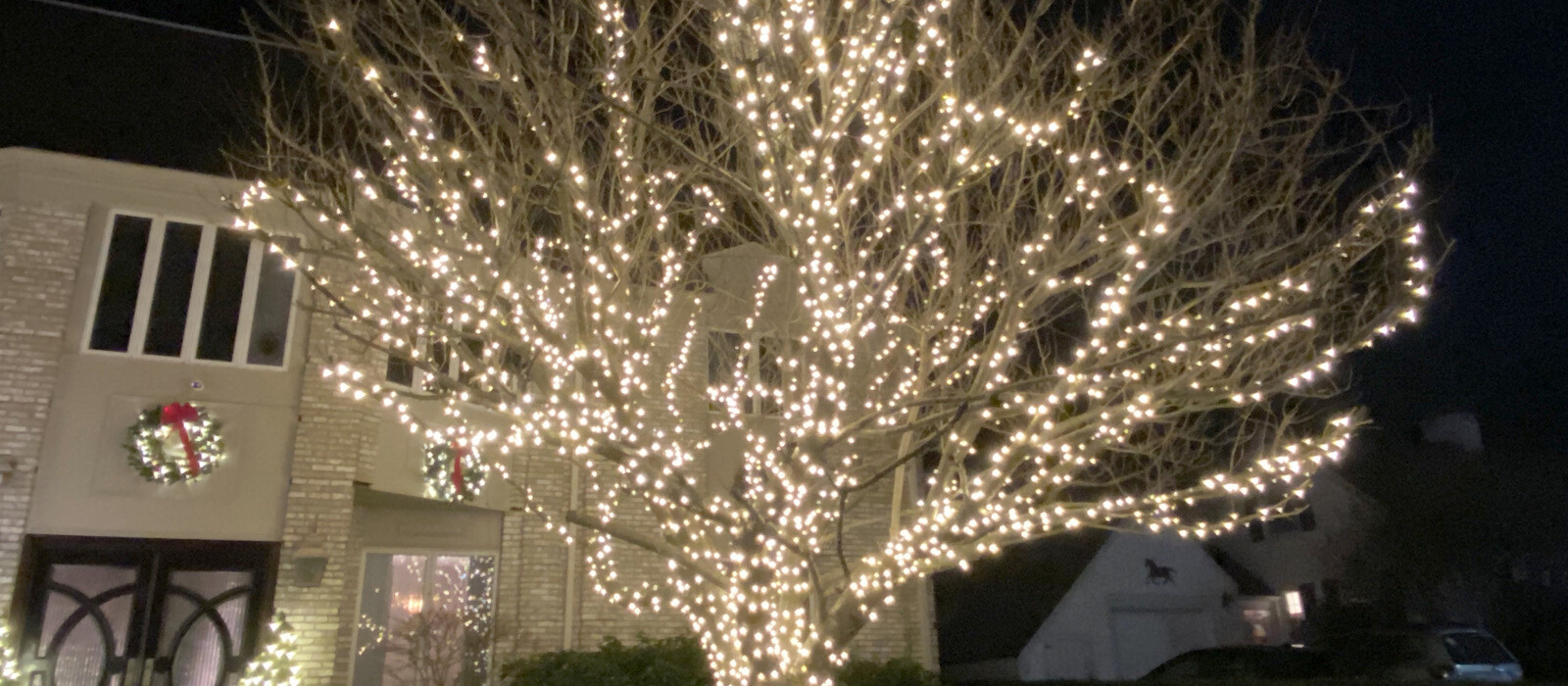 Festive home at night, Greater Boston